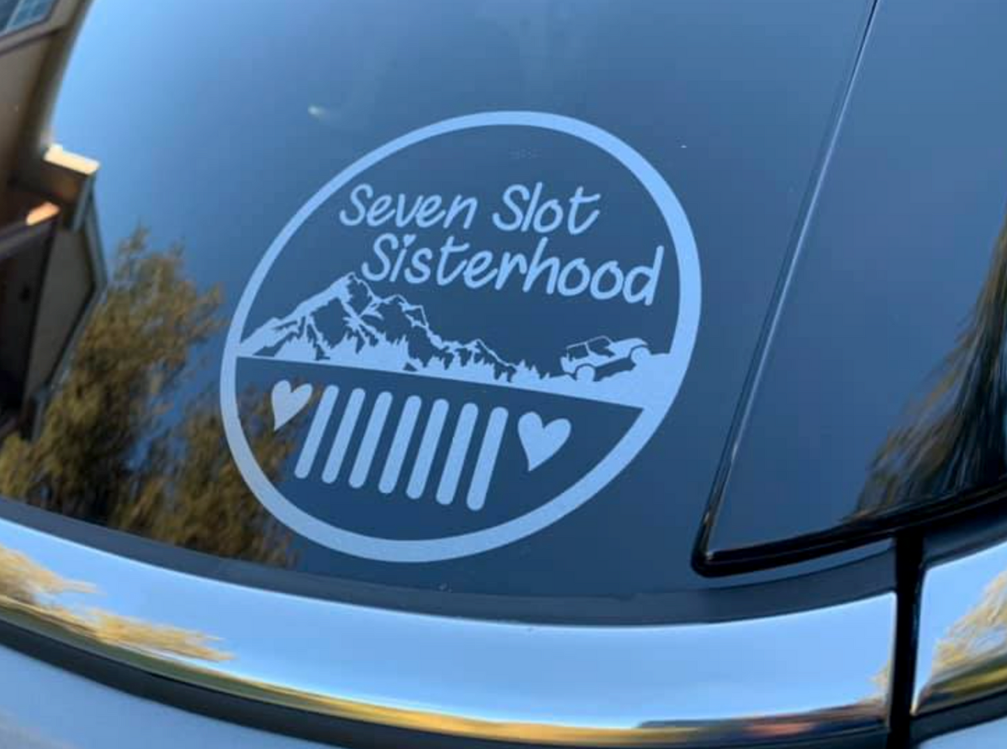 Seven Slot Sisterhood Mountain Round Logo